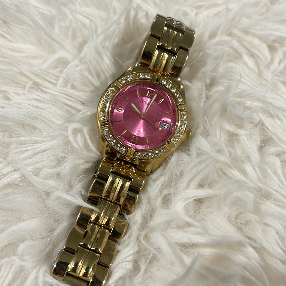 Gold and pink guess watch